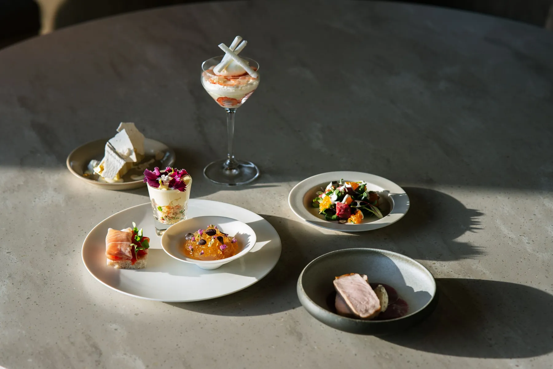 small plates on a stone table